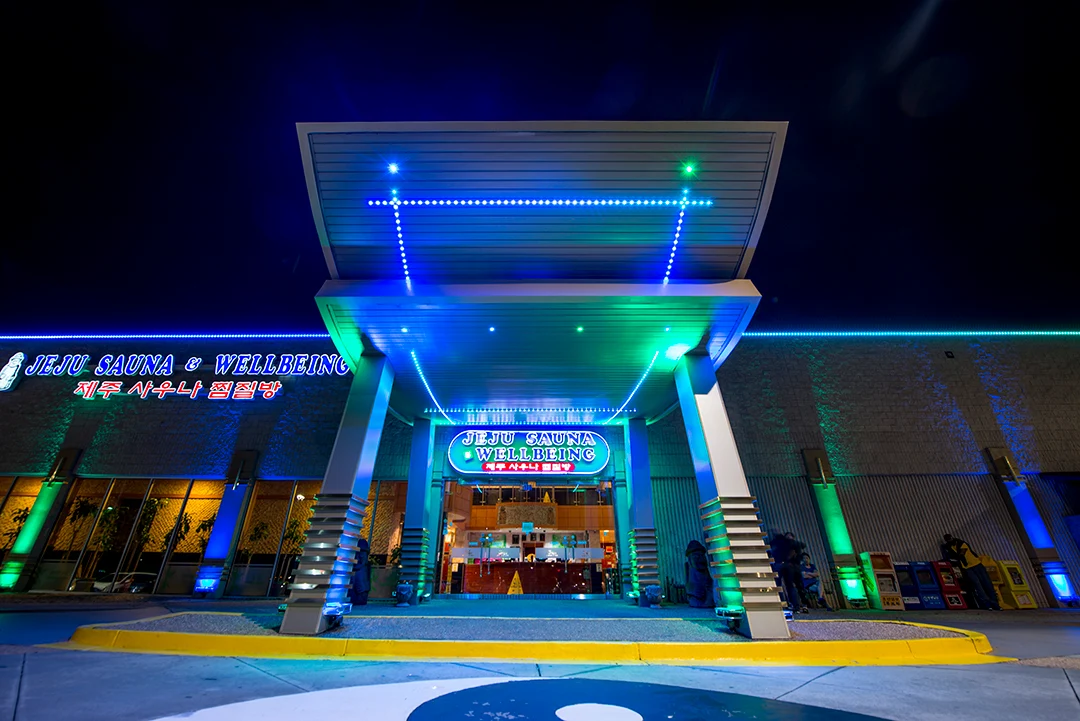 Jeju Sauna & Wellbeing exterior at night in Duluth, Georgia