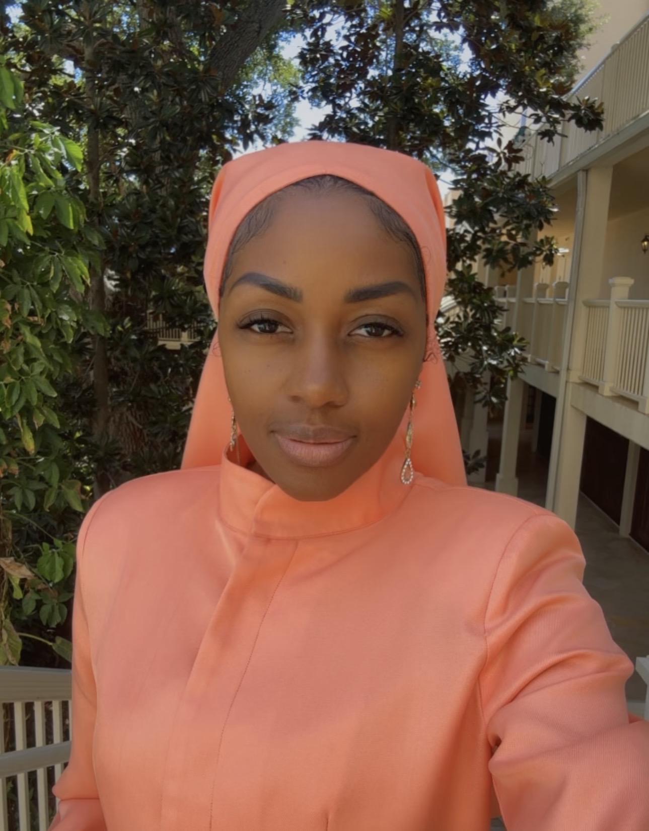 Portrait of Teadra, founder of Kun Faya Kun Wellness